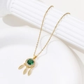 Golden dreamcatcher necklace with emerald green zircon and fine feather pendants - One Size / Gold