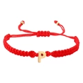 Adjustable red woven cord bracelet featuring a polished gold letter P charm - Red Rope P