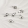 Detailed view of six silver-plated oval zircon pendants with 4-claw setting for DIY jewelry - Oval Style / 11.6*7mm / Silver