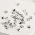 Detailed macro view of silver-plated irregular crushed stone metal spacer beads for DIY jewelry - Crushed Stone Texture (New A1-309) / White Gold
