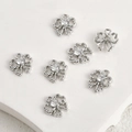 Vue détaillée de pendentifs nœuds argentés avec zircon pour création de bijoux DIY - Zirconia Blanc Nœud Argent Rhodié (10,6x10mm)