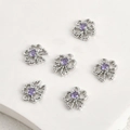 Detailed view of silver hollowed four-leaf clover charms with purple zircon inlay - Purple Zirconia Bow Rhodium Silver (10.6x10mm)