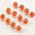 Macro detail of handmade orange glass mushroom beads with green leaf and pink dots - Orange Mushroom (4#Orange Grape)