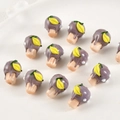 Macro detail of handmade lampwork glass cupcake beads in purple with banana decoration - Purple Cake (5#Taro Purple Lemon)