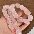 Macro view of faceted long barrel rose quartz beads with natural crystal texture - Rose Quartz / 1 Piece