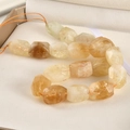 Macro detail of natural faceted citrine quartz beads for DIY jewelry making - Citrine / 1 Piece