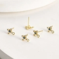 Macro detail of 14k gold plated cross star earring studs with blue zircon for DIY jewelry - 14k Gold Plated Blue Zircon Cross