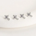 Macro detail of snowflake zircon charms with purple stone for DIY jewelry making - White K Plated Purple Zircon Cross