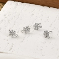Macro shot of silver snowflake ear studs with cubic zirconia and DIY hanging loops - Silver Snowflake Findings (A1-380)