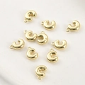 Macro shot of 14k gold-plated C-shaped pendant charms for DIY jewelry making - Letter C (3#C) / 1 Piece / Gold