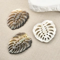 Three pieces of shell pendants in monstera leaf shape with natural mother of pearl luster - Large Monstera Style