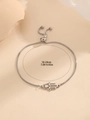 Detailopname van verstelbare roestvrijstalen bolo-armband met Hamsa-hand en sterbedel - Hamsa Hand