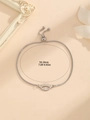 Detail of adjustable silver box chain bracelet with eye-shaped charm and slider clasp - Eyelash Evil Eye