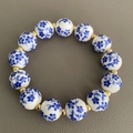 Bracciale vintage in ceramica blu e bianca con perline dorate in stile orientale - 12mm