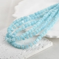 Detailed view of light blue cubic glass beads necklace with silver spacer beads - One Strand Approx 55 Beads / Amazonite Color