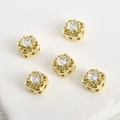 Detailed view of hollow gold-plated square spacers with sparkling cubic zirconia inlay - Square Spacer Bead (Gold)