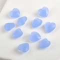 Detailed view of ten light blue faceted heart-shaped crystal beads for DIY jewelry making - Aquamarine Color Heart (Dyed)