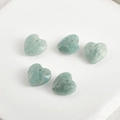 Macro view of five 13mm faceted amazonite heart charms with top-drilled holes for DIY - Amazonite Heart