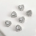 Macro detail of heart-shaped zircon charms showing fine pavé setting and hollow patterns - Approx 12.5*12mm / Heart Spacer Bead (Silver)