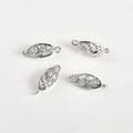 Detailed view of silver hollow oval jewelry connectors with cubic zirconia and double loops - 2# Oval Hollow Connector Silver Tone / 18.7*6.8mm