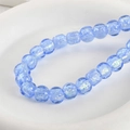 Macro shot of translucent blue glass beads with iridescent glitter on white stone base - 6# Denim Blue Iridescent Square