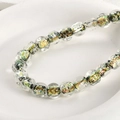 Close-up of clear glass square beads with colorful gold foil swirl for DIY jewelry making - 7# Black Iridescent Square