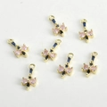 Détail des breloques nœud plaquées or 14 carats avec cristaux rose pour création de bijoux - Style Or 14K Zirconium Coloré