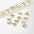 Macro detail of 14k gold plated butterfly spacers with zircon for DIY pearl jewelry - Butterfly Double Hole (9.7*5mm)