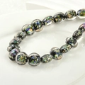 Macro shot of black iridescent glass beads with colorful metallic foil for DIY jewelry making - 4# White Black Foil Flat Round
