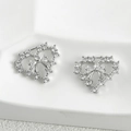 Detailed view of 14k plated heart pendant with bow design and shimmering zircon stones - Heart Bow Style / Silver
