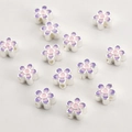 Macro detail of enamel flower beads with pink to lavender gradient for jewelry DIY - Silver Purple Pink Flower