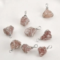 Detail of eight handmade rose quartz crystal pendants with silver wire wrap craftsmanship - Handmade Wire Wrap Style / Strawberry Quartz (Random)