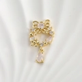 Detailed macro view of 14k gold-plated wreath pendant with pink heart and teardrop stones - 14k Gold Hollow Butterfly Wreath Water Drop (Pink Zirconia)