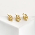 Detailed macro view of three 14k gold plated lemon pendants with yellow zircon stones - 14K Gold Plated Lemon / Yellow