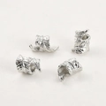 Detailed view of four silver feather-patterned metal spacer beads with intricate engraving - 1 Piece (15.4x10mm) / White K Large Leaf Spacer (4#)