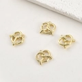 Detail of 14k gold plated pretzel heart charms with polished texture for DIY jewelry - 14k Smooth Heart Style / 14K Gold