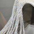 Macro detail of aurora AB finish transparent crystal glass beads for DIY jewelry making - 4mm Bubble Round Style