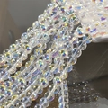 Macro shot of iridescent mermaid bubble glass beads with rainbow coating for DIY jewelry - 8mm Bubble Round Style
