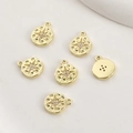 Macro shot of 14k gold-plated starburst pendants with sparkling zircons for jewelry making - 14K Gold Zirconia Starburst Disc (No. 5)