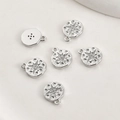 Detail of silver eight-point star pendants with hammered texture and cubic zirconia stone - White Gold Plated Zirconia Starburst Disc (6#)
