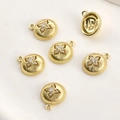 Macro view of 14k gold-plated star charms with zircon inlay and vertical texture - 14K Gold Bold Zirconia Starburst (Size 7)