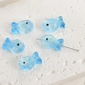 Macro shot of light blue fish-shaped glass beads with sparkling foil for DIY jewelry - Sea Blue Foil Fish (3#)