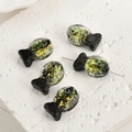 Macro shot of glass fish beads with gold foil inclusions for DIY jewelry making - Black Foil Fish (10#)