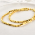Macro detail of gold-plated square lava beads with irregular texture for jewelry making - Imitation Gold (3mm)