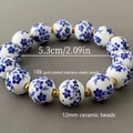 Bracciale in acciaio inossidabile placcato oro 18K con perle di porcellana 12mm - Oro
