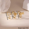 Set di tre anelli dorati 18K a tema marino con design a pesce e onde marine - Oro