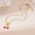 Detailed shot of 18K gold plated paperclip chain necklace with red cherry pendant - Cherry Necklace Style F (25WN034)