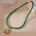 Colorful woven rope necklace with 18K gold plated sun pendant for summer vacation style - Sun