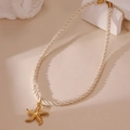 Marine style necklace with gold starfish pendant and white braided rope for summer beach vacation - Starfish
