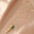 18K gold fish necklace with malachite bead and pearl on champagne satin background - 6-Segment Fish Style / Gold